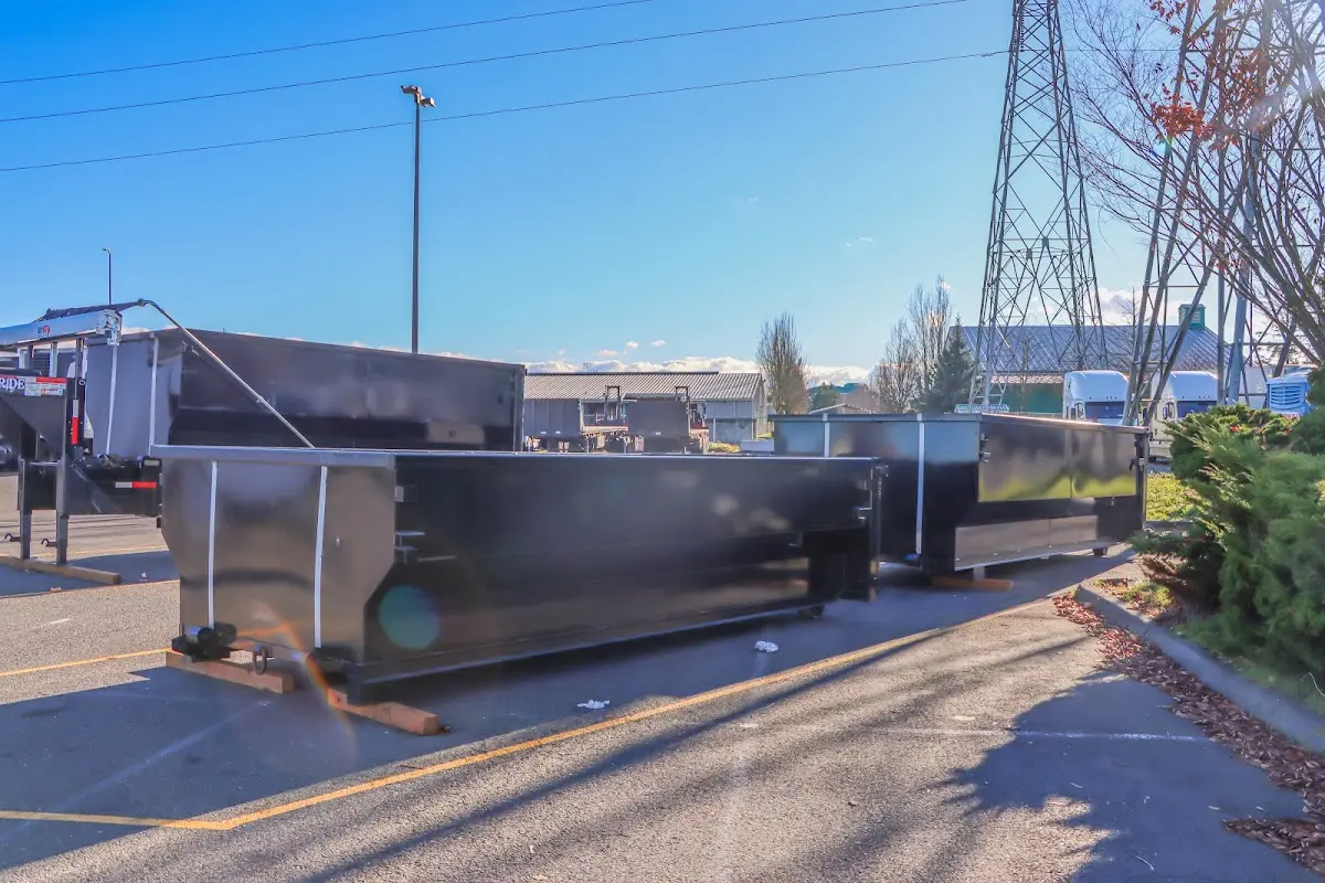 Roll-off dumpster ready for waste disposal at job site for Construction Dumpster Rental in Claremont
